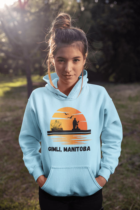 Featuring a sunset backdrop over the charming town of Gimli, Manitoba, with the iconic Viking statue front and center, this hoodie is your stylish ticket to Viking vibes without having to set sail.