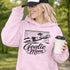 Woman wearing hoodie with goalie mom text and diving goalkeeper graphic