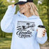Woman wearing hoodie with goalie mom text and diving goalkeeper graphic