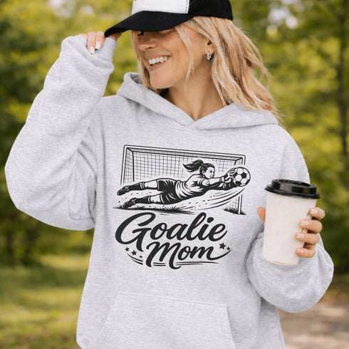 Woman wearing hoodie with goalie mom text and diving goalkeeper graphic