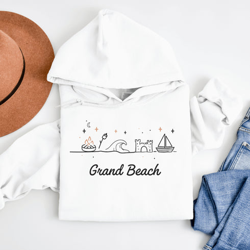 Bring the fun of summer days and campfire nights to your wardrobe with our Grand Beach Doodle hoodie!