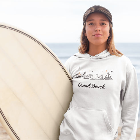 Bring the fun of summer days and campfire nights to your wardrobe with our Grand Beach Doodle hoodie!