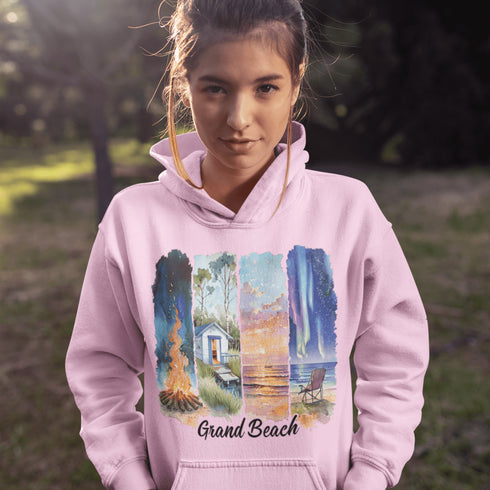 Celebrate the natural beauty and charm of Grand Beach with this cozy and stylish hoodie, featuring a soft watercolor collage of iconic local scenes.