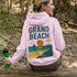 Bring the beach vibes wherever you go with our Grand Beach Retro Scene hoodie — a cozy nod to one of Manitoba’s most iconic summer destinations.