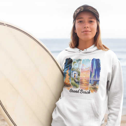 Celebrate the natural beauty and charm of Grand Beach with this cozy and stylish hoodie, featuring a soft watercolor collage of iconic local scenes.