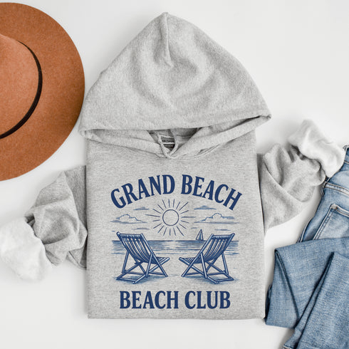Soak up the vintage vibes with our Grand Beach Beach Club hoodie — a cozy classic made for lakeside lounging and sunset chasing.