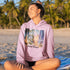 Celebrate the natural beauty and charm of Grand Beach with this cozy and stylish hoodie, featuring a soft watercolor collage of iconic local scenes.