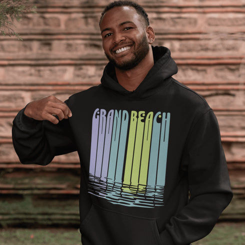 Bring the beach vibes wherever you go with our Grand Beach retro hoodie — a bold and colorful tribute to one of Manitoba’s most loved summer destinations.