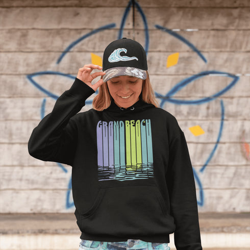 Bring the beach vibes wherever you go with our Grand Beach retro hoodie — a bold and colorful tribute to one of Manitoba’s most loved summer destinations.