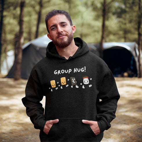 Introducing the ultimate camping companion - the Group Hug Camping Hoodie! Picture this: adorable cartoon s'mores characters chasing a rogue burning marshmallow across your chest, all while proclaiming "Group Hug!" Because who wouldn't want a cuddly trio of snacks on their apparel?