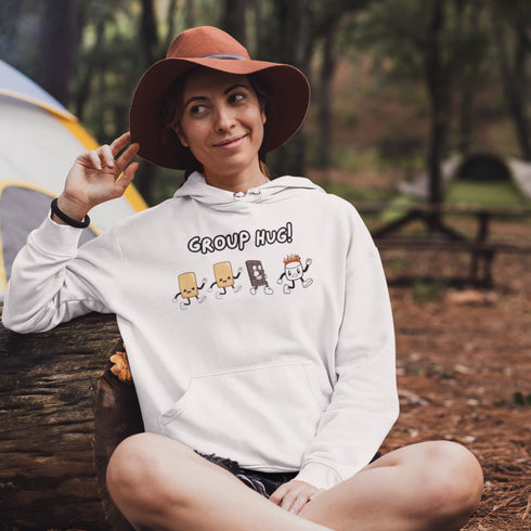 Introducing the ultimate camping companion - the Group Hug Camping Hoodie! Picture this: adorable cartoon s'mores characters chasing a rogue burning marshmallow across your chest, all while proclaiming "Group Hug!" Because who wouldn't want a cuddly trio of snacks on their apparel?