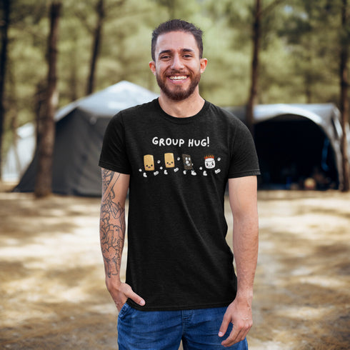 Introducing the ultimate camping fashion statement - our hilarious Group Hug T-shirt! Picture this: adorable cartoon s'mores characters sprinting after a rogue, blazing marshmallow like it's the last one on Earth. It's a scene straight out of a comedy sketch!