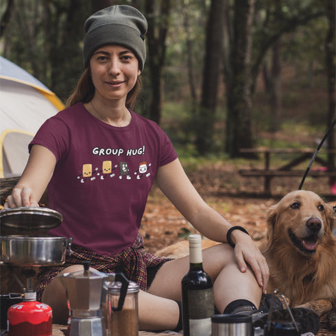Introducing the ultimate camping fashion statement - our hilarious Group Hug T-shirt! Picture this: adorable cartoon s'mores characters sprinting after a rogue, blazing marshmallow like it's the last one on Earth. It's a scene straight out of a comedy sketch!