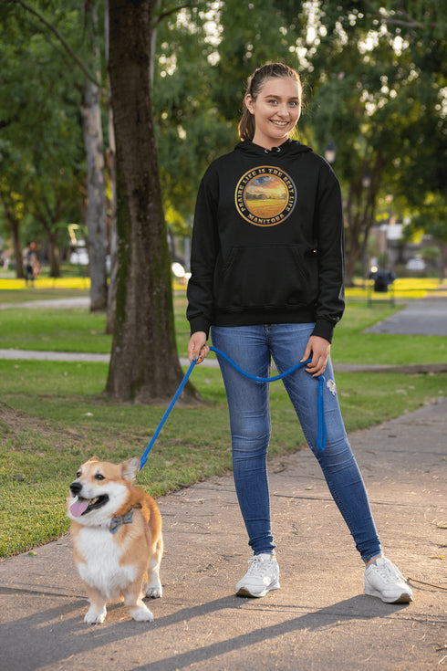 Featuring a breathtaking sunset over a golden wheat field on a farmer's land, this hoodie captures the peaceful essence of Manitoba’s rural charm.