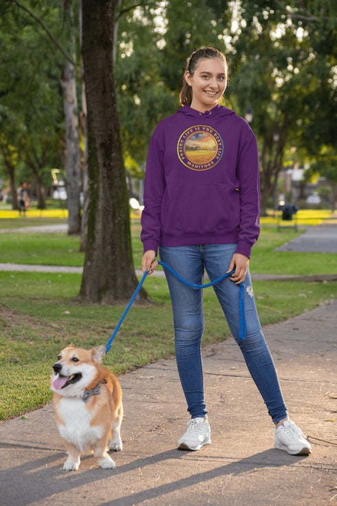Featuring a breathtaking sunset over a golden wheat field on a farmer's land, this hoodie captures the peaceful essence of Manitoba’s rural charm.