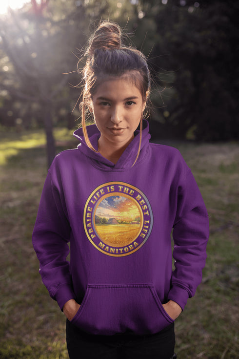 Featuring a breathtaking sunset over a golden wheat field on a farmer's land, this hoodie captures the peaceful essence of Manitoba’s rural charm.