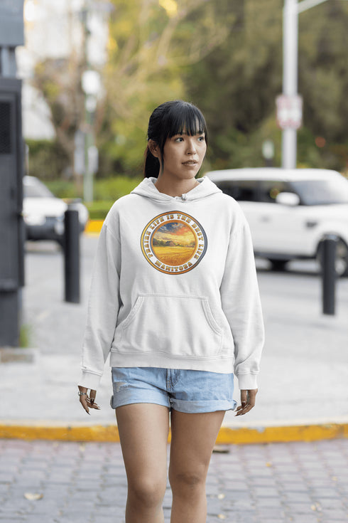 Featuring a breathtaking sunset over a golden wheat field on a farmer's land, this hoodie captures the peaceful essence of Manitoba’s rural charm.