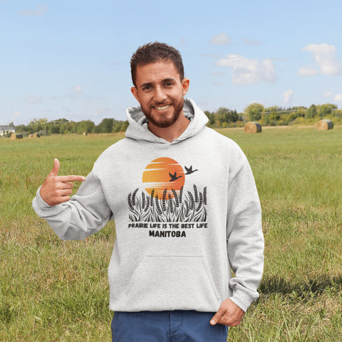 Featuring a stunning design of golden wheat fields stretching across the horizon under a vibrant Canadian sunset, this hoodie captures the peaceful simplicity of prairie life