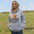 Featuring a stunning design of golden wheat fields stretching across the horizon under a vibrant Canadian sunset, this hoodie captures the peaceful simplicity of prairie life