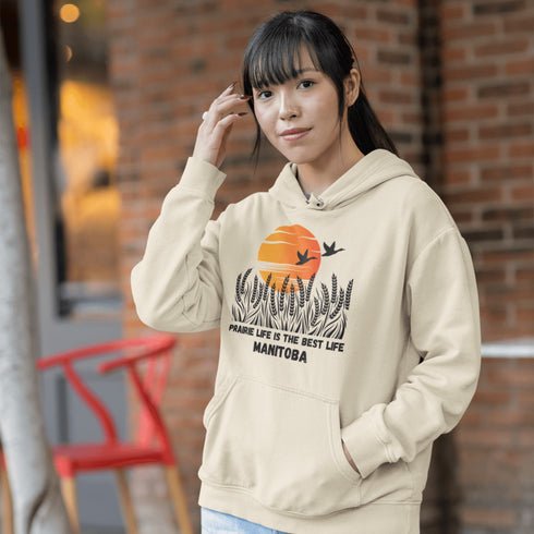 Featuring a stunning design of golden wheat fields stretching across the horizon under a vibrant Canadian sunset, this hoodie captures the peaceful simplicity of prairie life