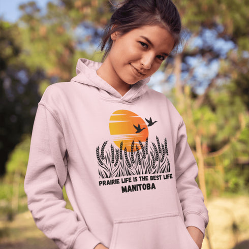 Featuring a stunning design of golden wheat fields stretching across the horizon under a vibrant Canadian sunset, this hoodie captures the peaceful simplicity of prairie life