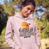 Featuring a stunning design of golden wheat fields stretching across the horizon under a vibrant Canadian sunset, this hoodie captures the peaceful simplicity of prairie life