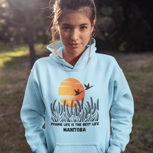 Featuring a stunning design of golden wheat fields stretching across the horizon under a vibrant Canadian sunset, this hoodie captures the peaceful simplicity of prairie life