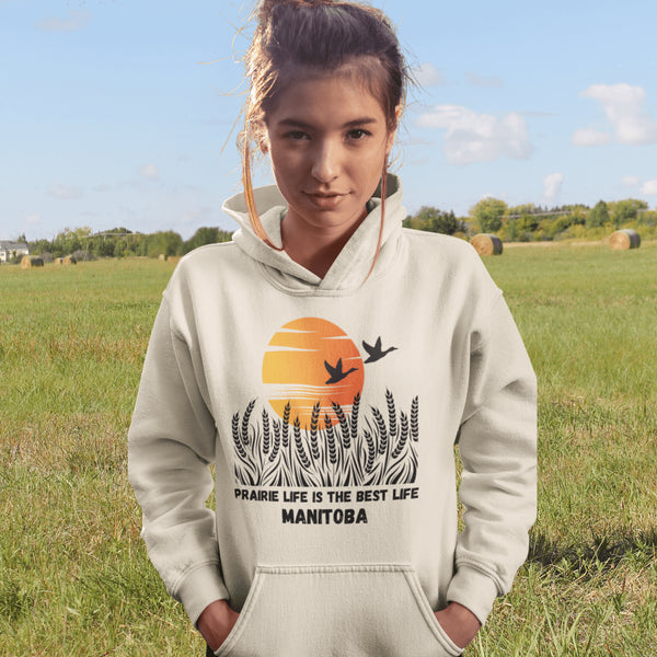 Featuring a stunning design of golden wheat fields stretching across the horizon under a vibrant Canadian sunset, this hoodie captures the peaceful simplicity of prairie life.
