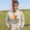 Featuring a stunning design of golden wheat fields stretching across the horizon under a vibrant Canadian sunset, this hoodie captures the peaceful simplicity of prairie life.
