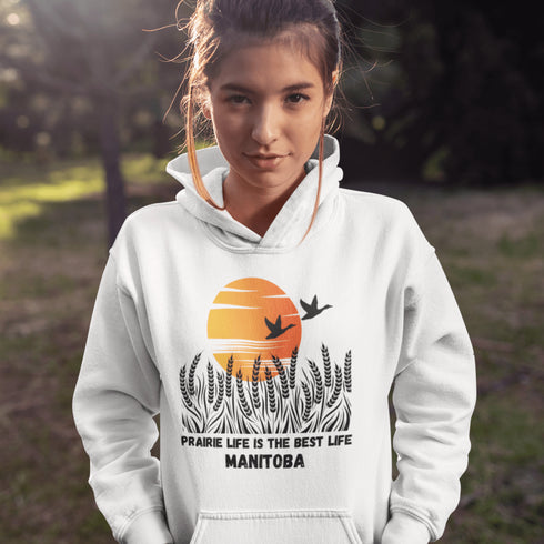 Featuring a stunning design of golden wheat fields stretching across the horizon under a vibrant Canadian sunset, this hoodie captures the peaceful simplicity of prairie life