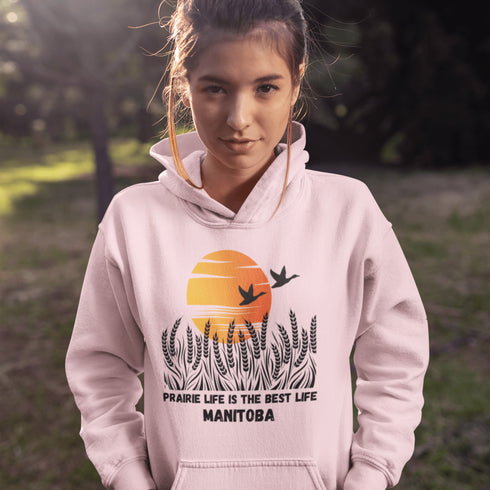 Featuring a stunning design of golden wheat fields stretching across the horizon under a vibrant Canadian sunset, this hoodie captures the peaceful simplicity of prairie life