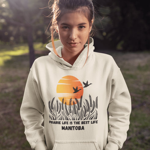Featuring a stunning design of golden wheat fields stretching across the horizon under a vibrant Canadian sunset, this hoodie captures the peaceful simplicity of prairie life