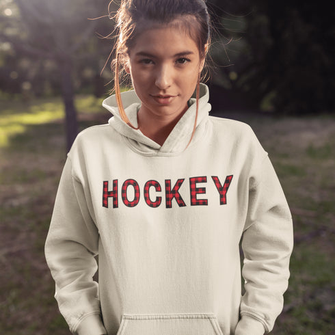 Introducing the Canada Hockey Hoodie, featuring "Hockey" in bold red and black Canadian plaid lettering—because nothing says “I’m Canadian” like plaid and hockey pride.