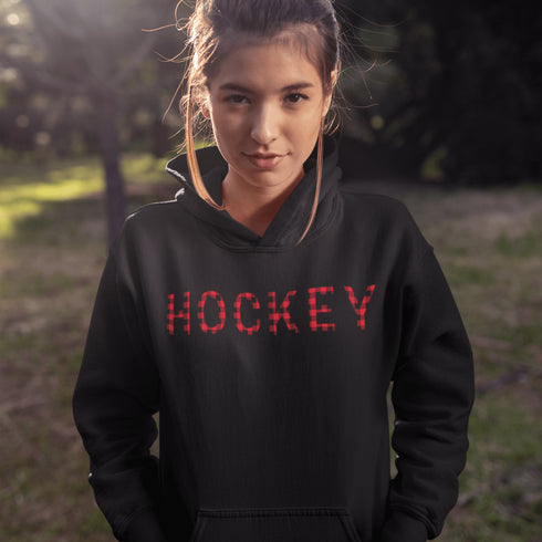 Introducing the Canada Hockey Hoodie, featuring "Hockey" in bold red and black Canadian plaid lettering—because nothing says “I’m Canadian” like plaid and hockey pride.