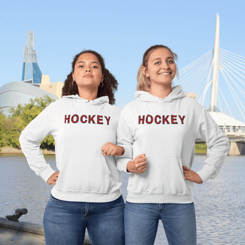 Introducing the Canada Hockey Hoodie, featuring "Hockey" in bold red and black Canadian plaid lettering—because nothing says “I’m Canadian” like plaid and hockey pride.