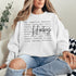 Hockey sweatshirt with bold script lettering and descriptive words design on a cozy crewneck, perfect for hockey players and fans