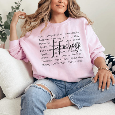 Hockey sweatshirt with bold script lettering and descriptive words design on a cozy crewneck, perfect for hockey players and fans