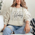 Hockey sweatshirt with bold script lettering and descriptive words design on a cozy crewneck, perfect for hockey players and fans