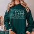 Hockey sweatshirt with bold script lettering and descriptive words design on a cozy crewneck, perfect for hockey players and fans