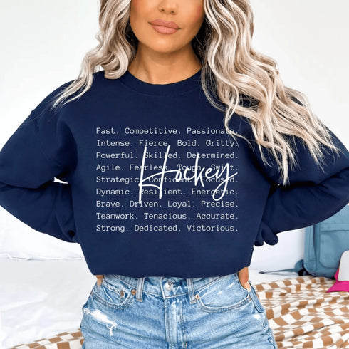 Hockey sweatshirt with bold script lettering and descriptive words design on a cozy crewneck, perfect for hockey players and fans