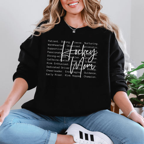Hockey Mom sweatshirt with handwritten script typography and descriptive text design on a cozy crewneck, perfect for rink moms and hockey season