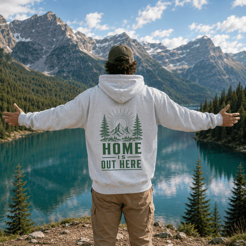 Vintage-inspired outdoor hoodie featuring a coordinating left chest graphic and large back graphic, displayed in a lifestyle mockup inspired by hiking, camping, mountains, lakes, and outdoor adventures.