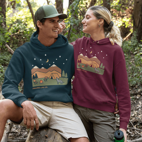 Inspired by moonlit nights and the untamed call of the wilderness, the Howling Wolf Camping Hoodie captures the raw beauty of life outdoors.
