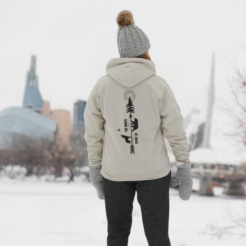 This hoodie features an eye-catching graphic that includes a Polar bear, a Wolf howling at the moon, and a tree with a sun.