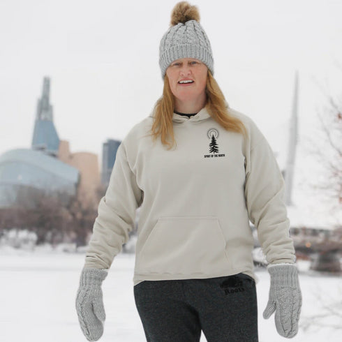 This hoodie features an eye-catching graphic that includes a Polar bear, a Wolf howling at the moon, and a tree with a sun.