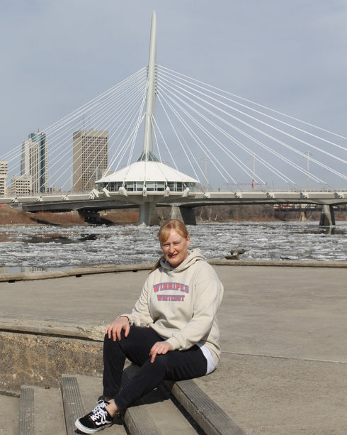 Introducing the ultimate symbol of fan loyalty and community spirit: the "Winnipeg Whiteout" Hoodie, inspired by the electrifying playoff party atmosphere synonymous with our beloved Winnipeg Jets.