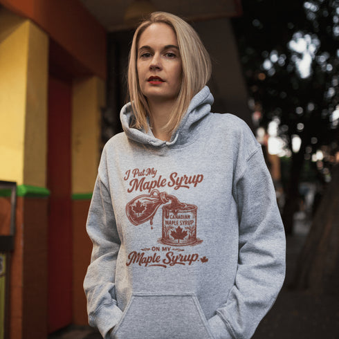 Funny maple syrup hoodie that says “I Put My Maple Syrup On My Maple Syrup” Canadian humor hoodie with vintage maple syrup graphic.