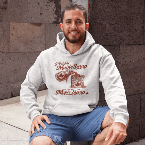 Funny maple syrup hoodie that says “I Put My Maple Syrup On My Maple Syrup” Canadian humor hoodie with vintage maple syrup graphic.