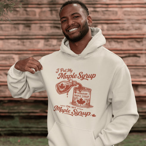 Funny maple syrup hoodie that says “I Put My Maple Syrup On My Maple Syrup” Canadian humor hoodie with vintage maple syrup graphic.