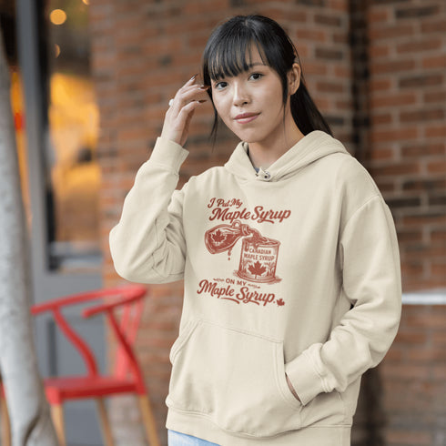 Funny maple syrup hoodie that says “I Put My Maple Syrup On My Maple Syrup” Canadian humor hoodie with vintage maple syrup graphic.